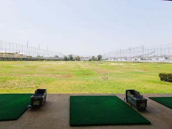 View of soccer field against clear sky