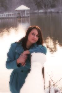 Portrait of beautiful woman standing in water