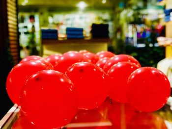 Close-up of red cherries in store