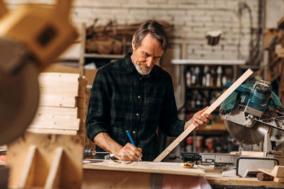 Man working on wood