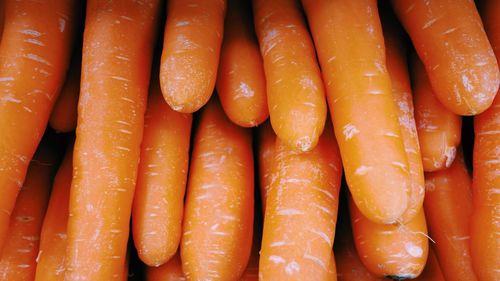 Full frame shot of carrots for sale at market