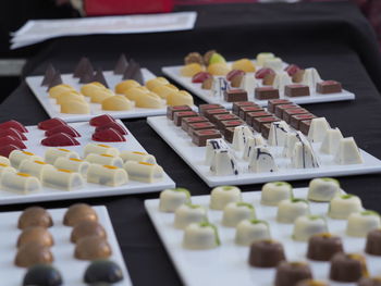 Close-up of chocolates in plates