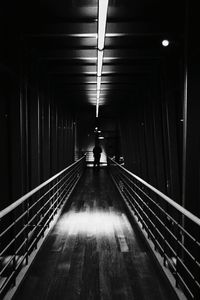 Woman walking in corridor