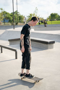 Full length of man skateboarding on skateboard