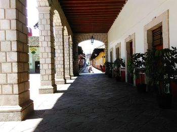 Alley amidst buildings in city