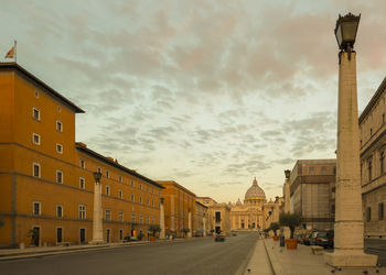 City street against cloudy sky