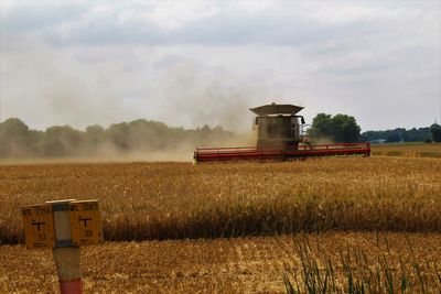 View of agricultural field against sky