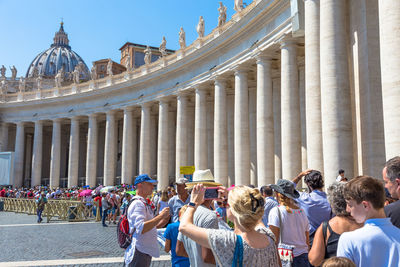 Group of people in front of historical building