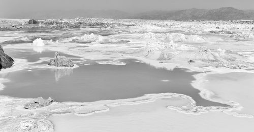 Scenic view of sea shore during winter