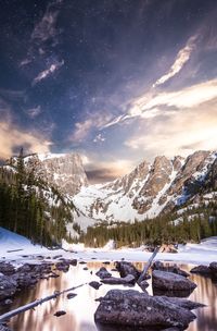 Scenic view of snowcapped mountains against sky