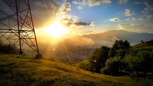 Scenic view of landscape against sky during sunset