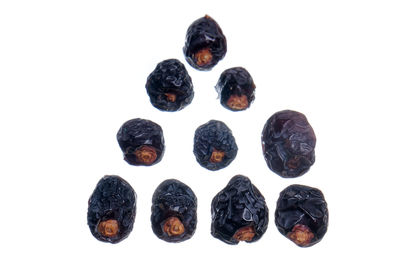 Close-up of fruits against white background