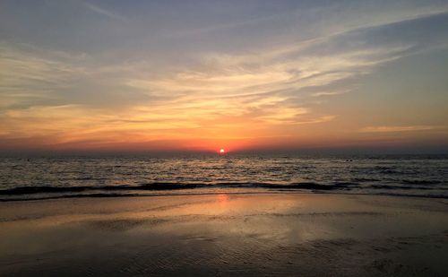 Scenic view of sea against sky at sunset