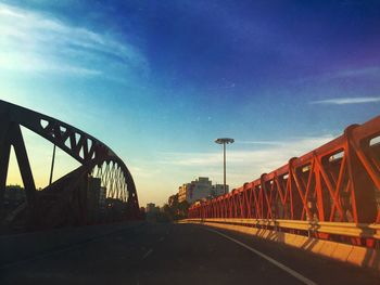 View of bridge against cloudy sky