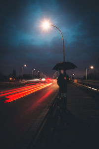 Light trails on road at night