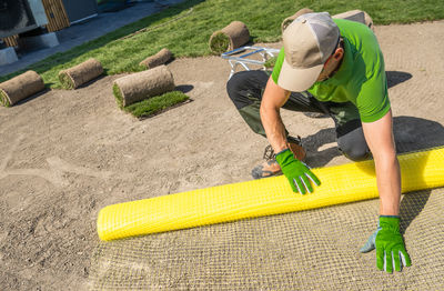 High angle view of man working on field