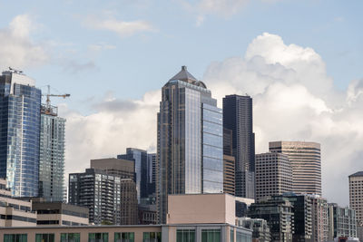 Low angle view of skyscrapers against sky