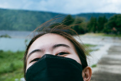 Close-up portrait of young woman