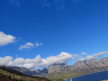 View of mountain range against cloudy sky