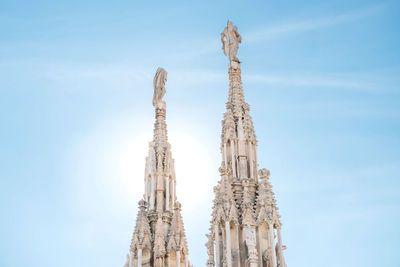 Low angle view of traditional building against blue sky