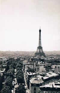 City skyline with tower in background