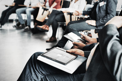 Group of people sitting on table