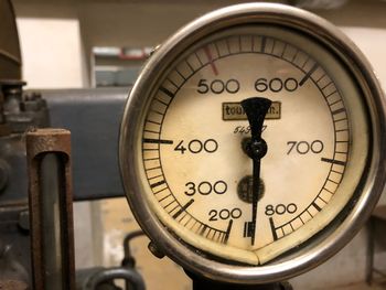 Close-up of pressure gauge in factory