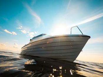 Low angle view of boat in sea against sky