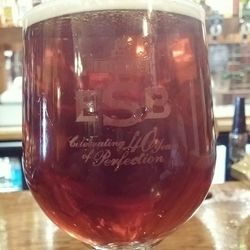 Close-up of wine glasses on table