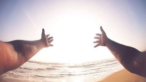 Close-up of hand against clear sky