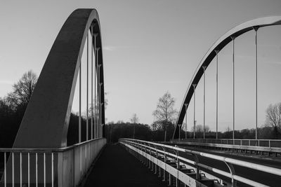 Bridge against sky in city