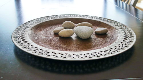 High angle view of eggs in plate on table