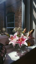 Close-up of pink flowers on table