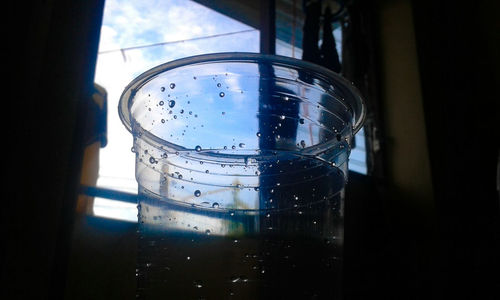 Close-up of water seen through window