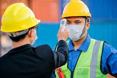 Concepts in preventing contagious diseases. medical infrared thermometer use body thermometer