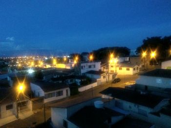 High angle view of illuminated buildings at night