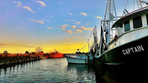 View of canal at sunset