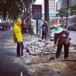 Full length of woman standing in city