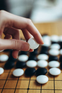 Close-up of hands playing piano