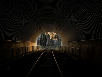 Empty railway bridge in tunnel