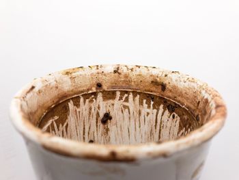 Close-up of drink against white background