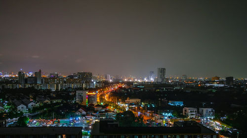 Illuminated cityscape at night