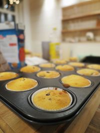 Close-up of cupcakes in baking sheet