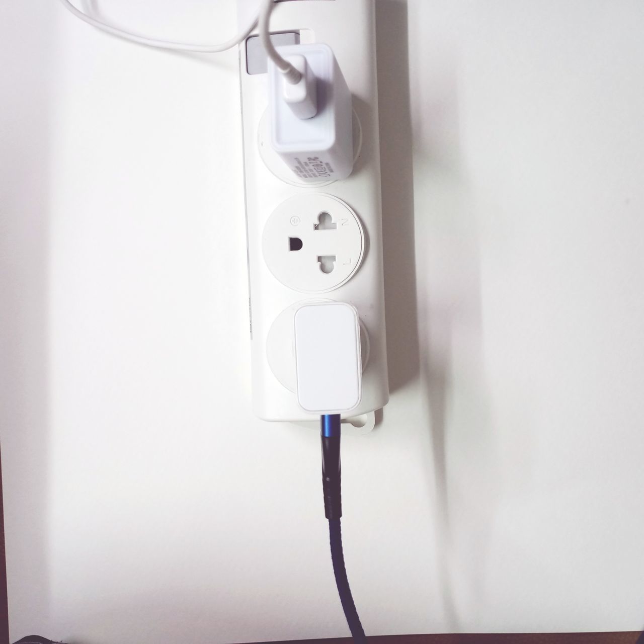 power plugs and sockets, technology, electricity, cable, indoors, wall - building feature, electric plug, home interior, outlet, no people, white, power supply, domestic room