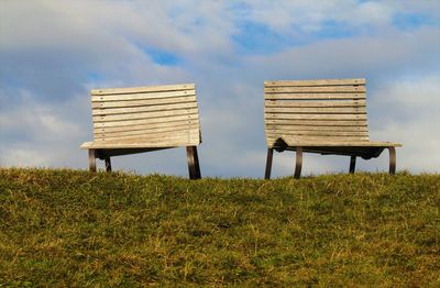 Built structure on field against sky