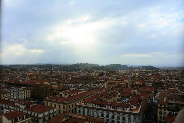 architecture, building exterior, built structure, cityscape, city, sky, crowded, cloud - sky, residential district, high angle view, residential structure, residential building, cloudy, cloud, roof, city life, day, outdoors, house, town