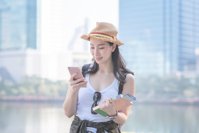 Young woman using mobile phone