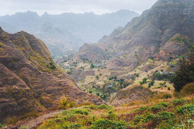 Scenic view of valley and mountains