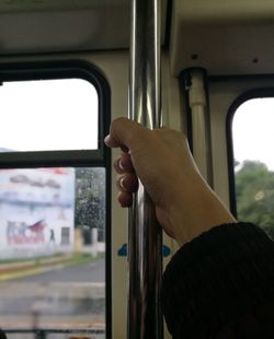 Cropped image of train window at railroad station