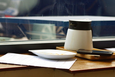 Close-up of tea cup on table